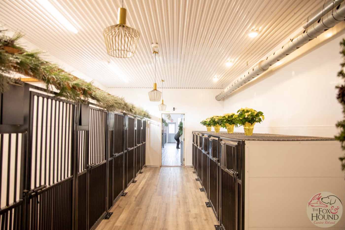 The overnight suites hallway, with garland along the top of the suites